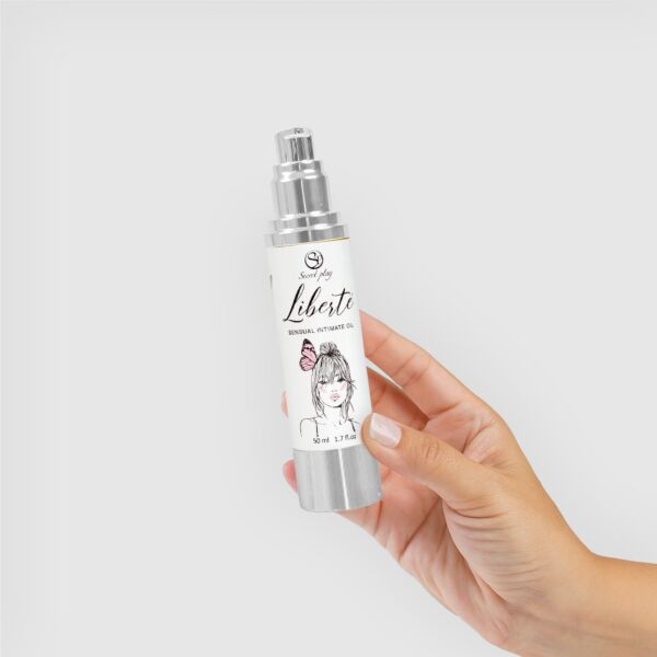 Óleo hidratante íntimo Secret Play Liberté na sua embalagem airless de 50 ml