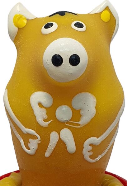 Preservativo decorativo Condomerie Pig Sitting Yellow com a forma de um porco amarelo sentado