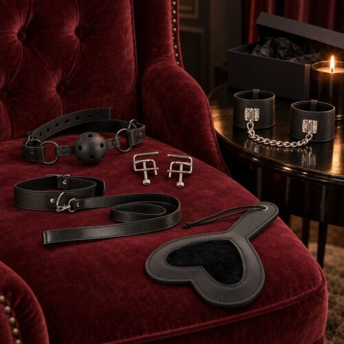 Kit BDSM intermédio com mordaça, pinças, coleira, pá e algemas – cena de ambiente (imagem gerada por IA)